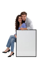 Couple With Blank Picture Frame