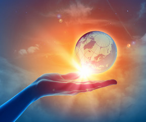 Wall Mural - image of earth planet on hand