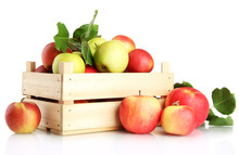Juicy Apples With Green Leaves In Wooden Crate, Isolated