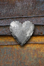 Metal Heart On Rusty Background