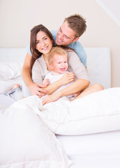 Poster - familie im bett