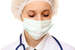 © lenets_tan - A female doctor wearing a mask, isolated on white