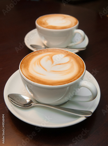 Fototapeta na wymiar two cappuccino cups