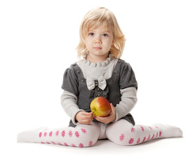 baby girl with apple