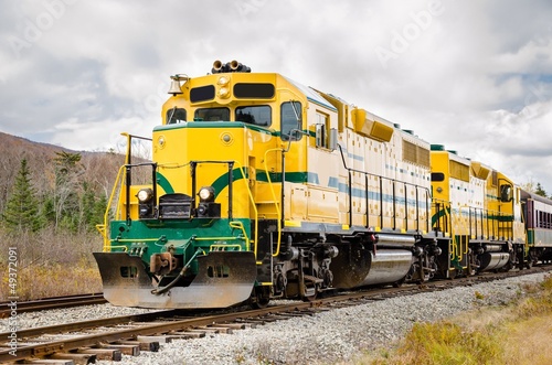 Fototapeta na wymiar Diesel Locomotive and Cloudy Sky