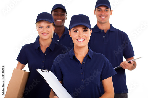 Fotografía group of delivery service staff half length on white