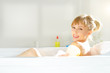 © Anton Maltsev - girl relaxing in bathtub