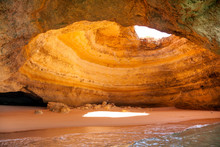 Famous Cave At Benagil Beach In Algarve Portugal
