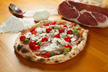 Typical Italian Pizza, Ingredients In Background On Wood Table