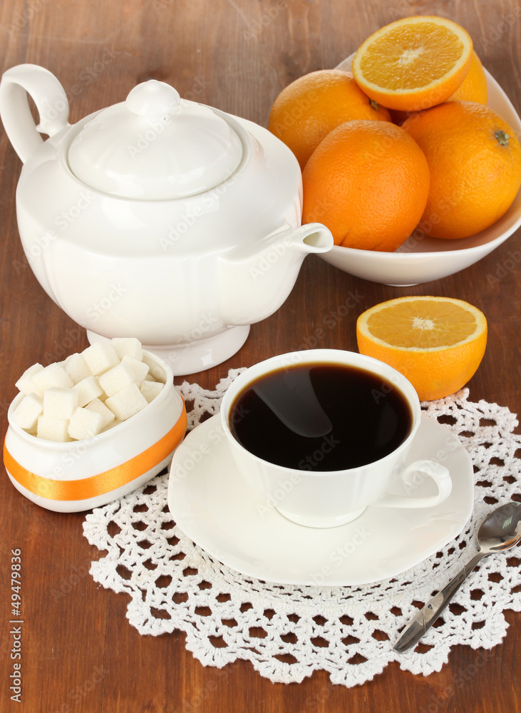 Beautiful white dinner service with oranges
