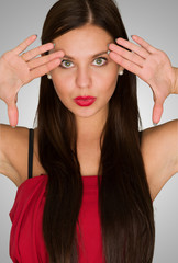 Portrait Of Young Woman Gesturing