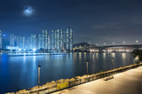 Fototapeta  - Full moon over Hong Kong City
