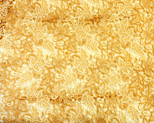 Detail of gold lace pattern fabric