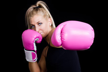 Beautiful Boxing Girl Wearing Pink Gloves - Focus On Hand