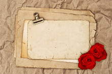 Old Blank Paper And Two Rose Flowers
