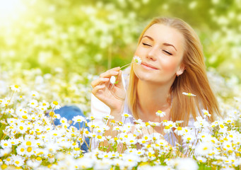 Wall Mural - Woman in chamomile field