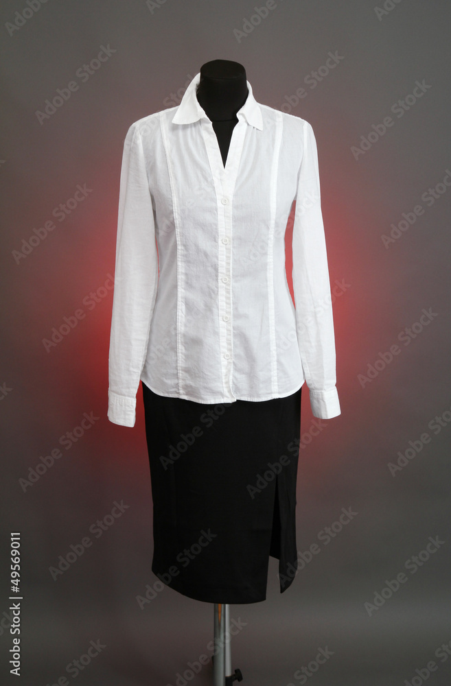 White blouse and black skirt with coat