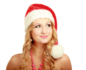 Portrait of a beautiful woman wearing a santa hat