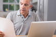 © WavebreakmediaMicro - Mature man using his laptop
