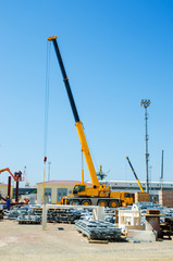 Construction crane on bright summer day