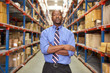 © Monkey Business - Portrait Of Businessman In Warehouse