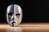 Mask against the dark background