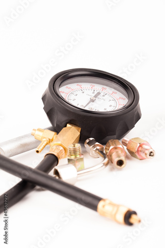 Fotografia, Obraz pressure gauge and tools isolated on white