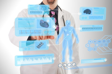 Male doctor working on a futuristic touchscreen display