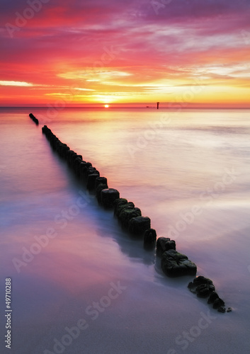 Fototapeta na wymiar Beach in Poland - Baltic sea at sunrise