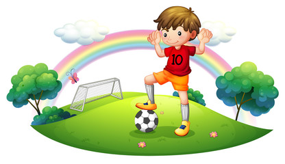 Poster - A boy in a soccer field