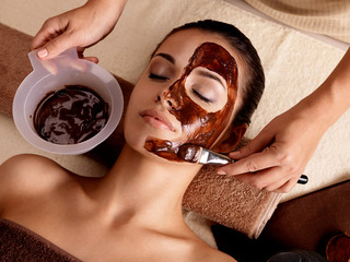 Wall Mural - Spa therapy for woman receiving cosmetic mask