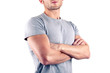 © pio3 - Crossed arms close up of muscular man on white background.