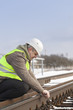 © Stock Photos & Video - Railroad worker with adjustable wrench fix the nut