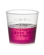 Cold or cough syrup medicine in a measuring cup isolated on whit
