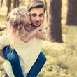 © VectorART - a young couple in love having fun in the spring forest