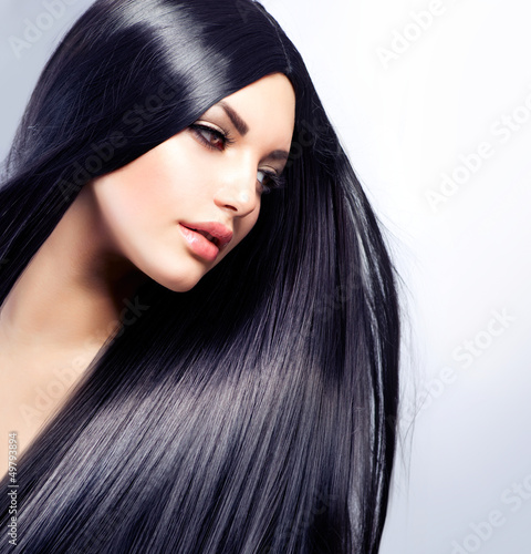 Naklejka na meble Beautiful Brunette Girl. Healthy Long Hair