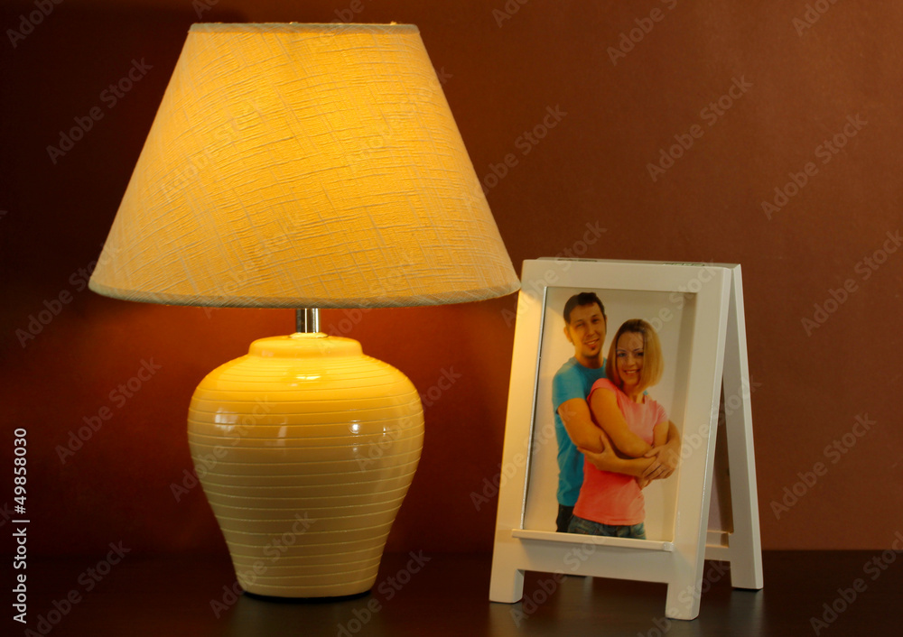 White photo frame and lamp