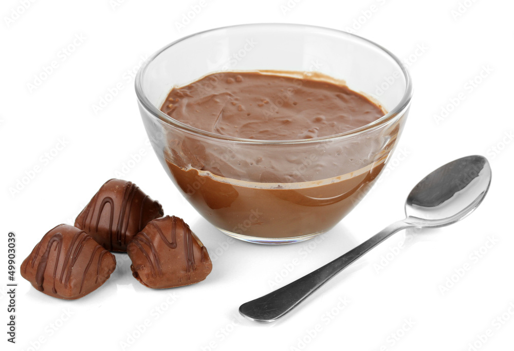 Bowl of chocolate and sweets isolated on white