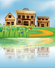 Poster - A pond with a reflection of the wooden houses