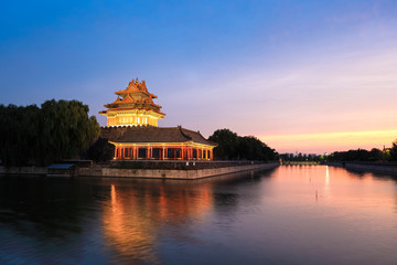 Fototapete - the turret of forbidden city in sunset