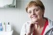 © Vera Kuttelvaserova - happy senior woman in the bathroom