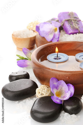 bedruckte Baumwollstoffe - Beautiful spa setting with flowers, isolated on white (von Africa Studio)