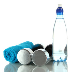 Wall Mural - Dumbbells with towel and bottle of water isolated on white