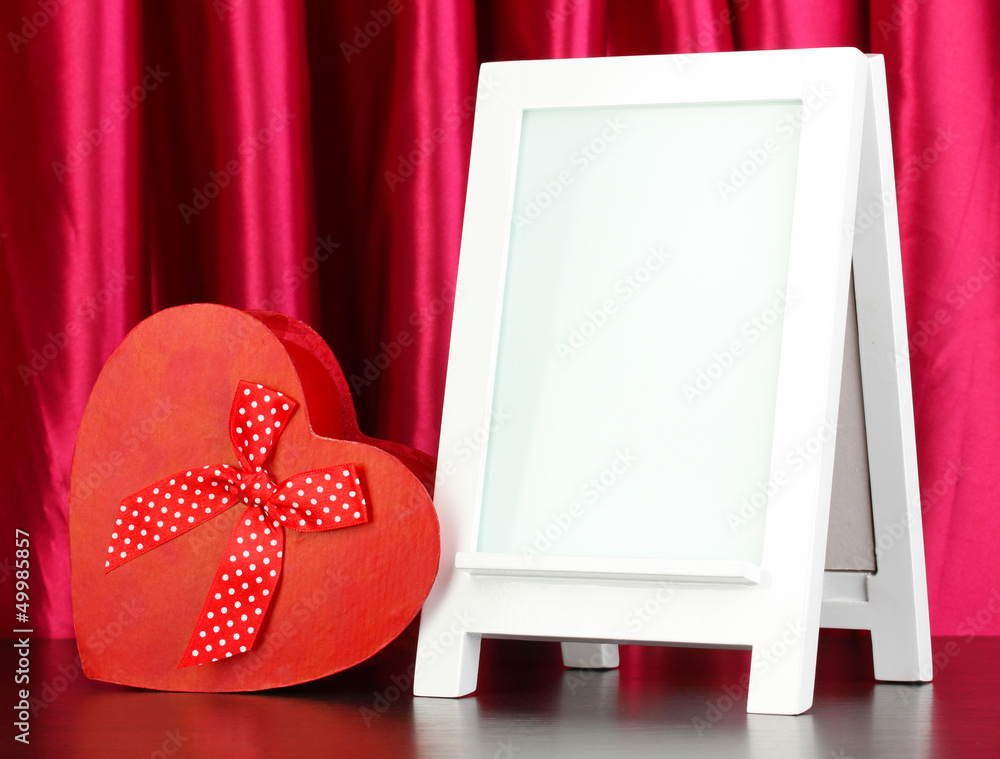 White photo frame for home decoration on curtains background