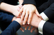 © cristovao31 - Closeup of pile of hands of business partners
