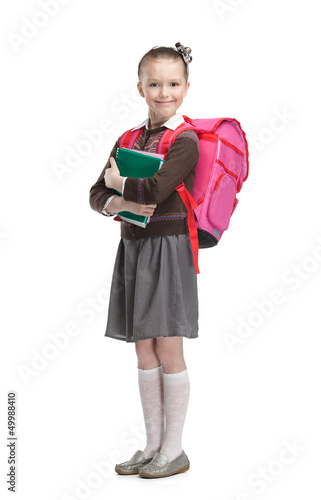Pupil with suitcase and exercisebooks is ready to go to school Canvas Print