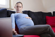 © grufnar - pregnant woman working from home