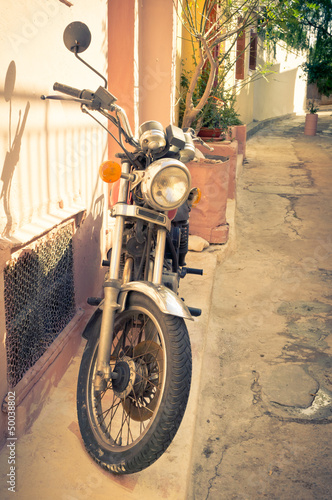 Fototapeta na wymiar Classic vintage motorcycle in Athens, Greece