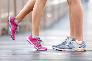 Love sport concept - running couple kissing