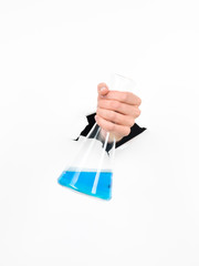 Wall Mural - femal hand holding chemistry flask